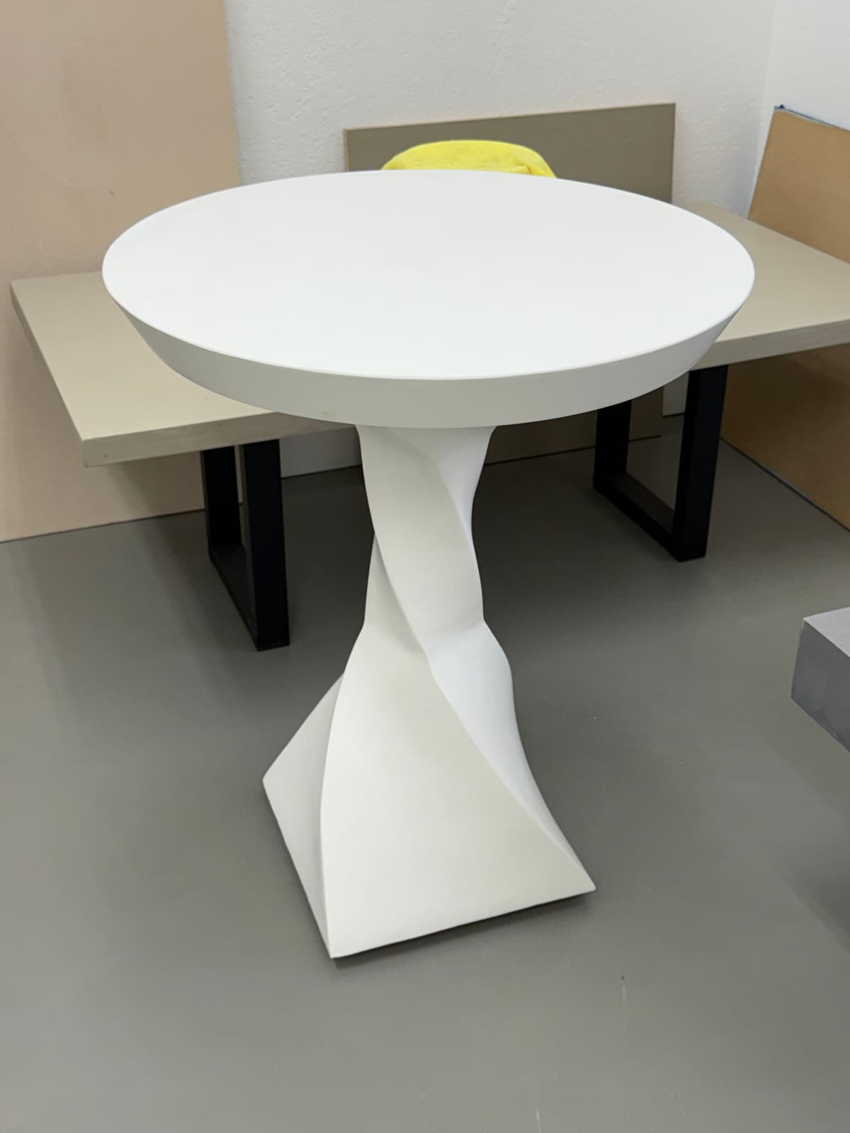 Custom wood carved microcement table — microcement installation by LUXE Surface Finishing