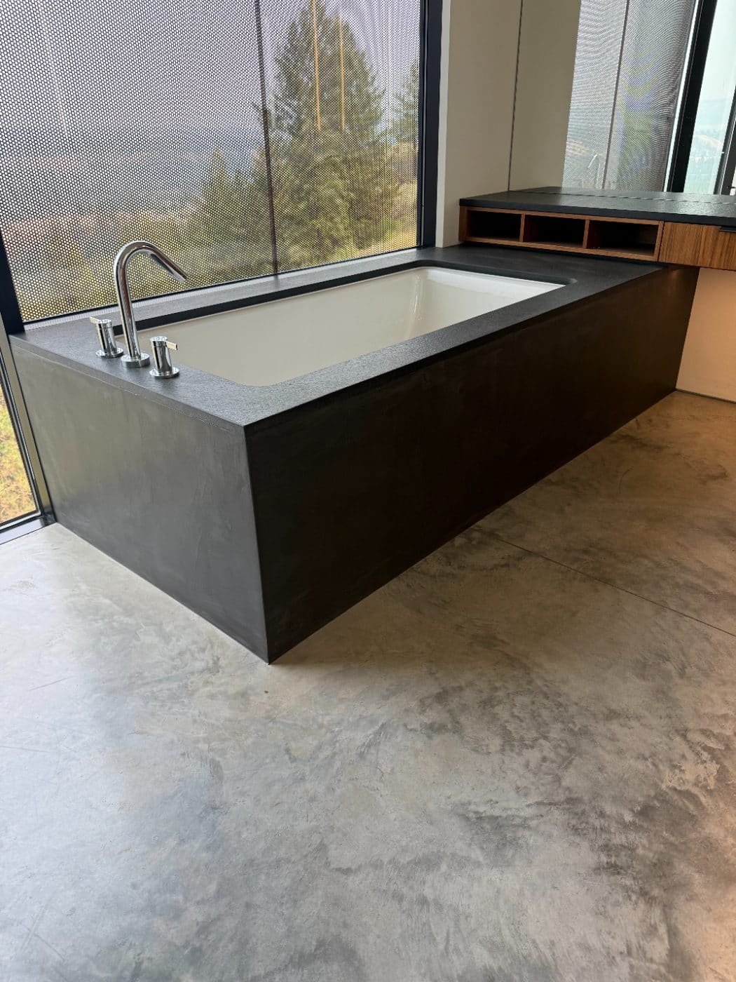 Freestanding tub — microcement installation by LUXE Surface Finishing