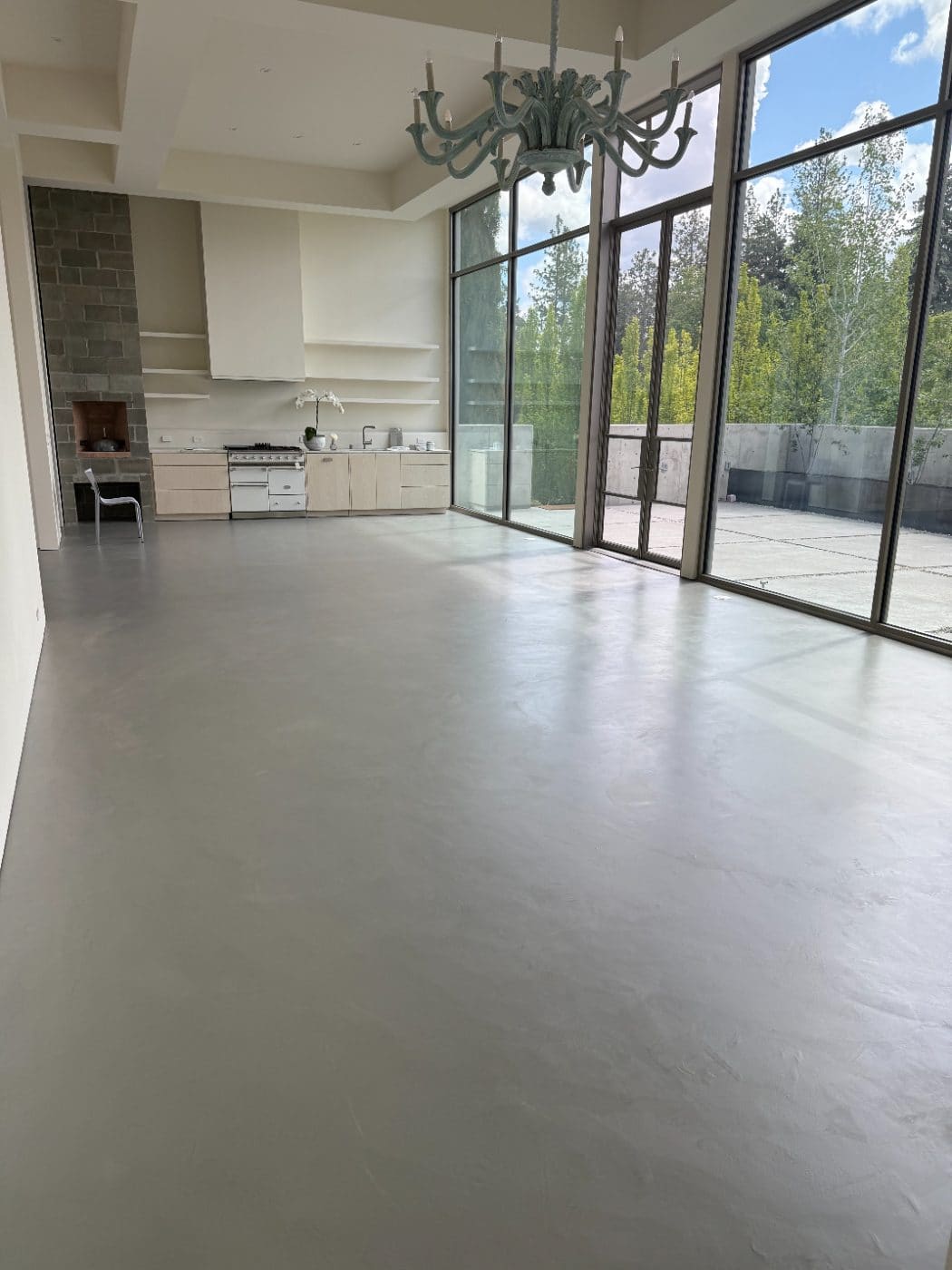 Kitchen floor and glazing in microcement