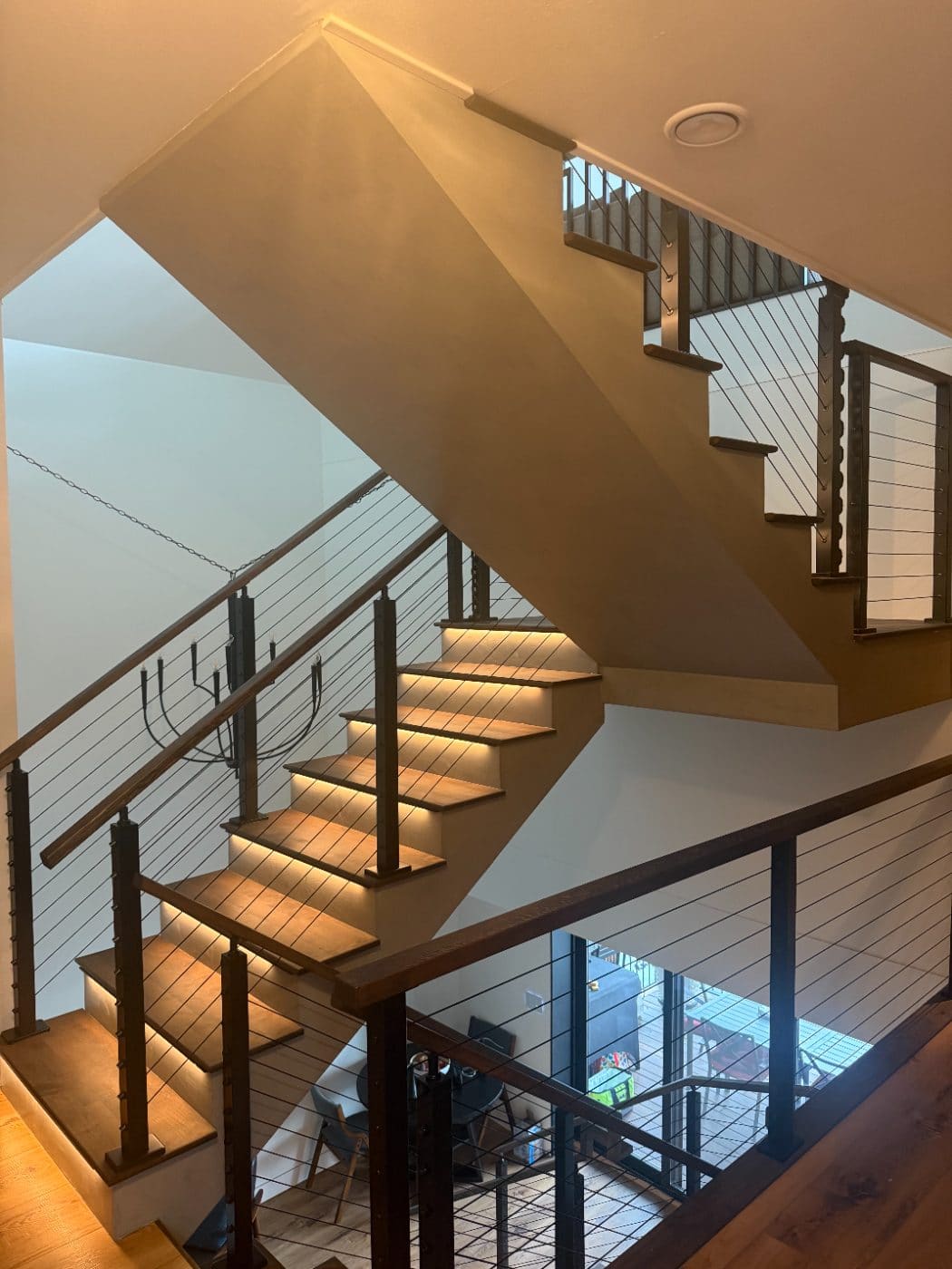 Open-riser stair finished with microcement